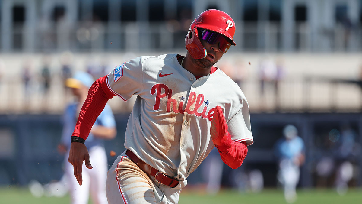 Philadelphia Phillies outfielder Justin Crawford (80) runs home to score against the Tampa Bay Rays during the fourth inning at Charlotte Sports Park.