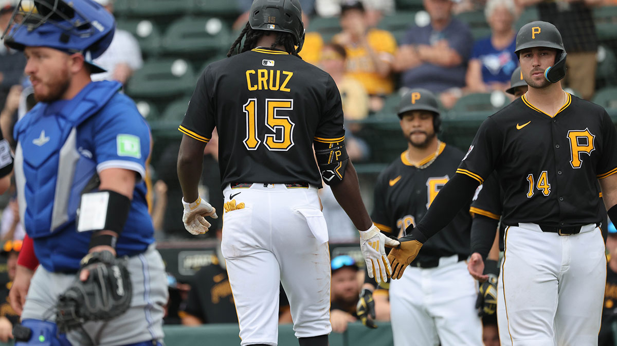 Pittsburgh Pirates outfield Oneil Cruz (15) is congratulated by Pittsburgh Pirates catcher Joey Bart (14) after he hit a 3-run home run ]during the fifth inning against the Toronto Blue Jays at LECOM Park.