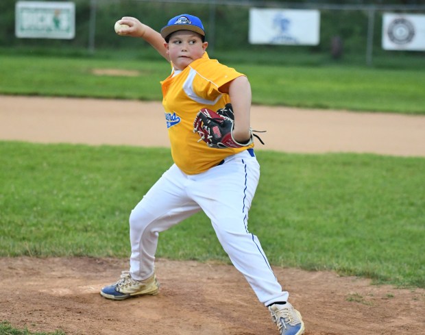 Brewers Bentley Trimbur tries to close the door on the...