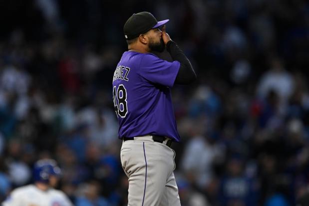 Rockies starting pitcher German Marquez reacts after giving up an RBI single to the Cubs' Seiya Suzuki on May 27, 2025, at Wrigley Field. (AP Photo/Paul Beaty)