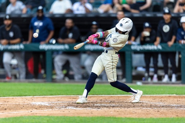 Thornwood's Amira Hondras (3) connects for a two-run single against the West All-Stars during the Double Duty Classic at Rate Field in Chicago on Wednesday, July 2, 2025. (Vincent D. Johnson / for the Daily Southtown)