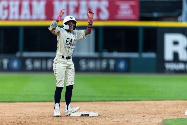 Thornwood's Amira Hondras (3) celebrates after getting a 2-RBI single against the West All-Stars during the Double Duty Classic at Rate Field in Chicago on Wednesday, July 2, 2025. (Vincent D. Johnson / for the Daily Southtown)