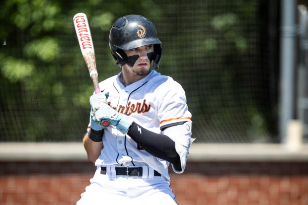 Lincoln-Way West's Conor Essenburg (8) leans back after an inside pitch from Sandburg during the Class 4A Sandburg Regional final in Orland Park on Saturday, May 25, 2024. (Vincent D. Johnson/for the Daily Southtown)