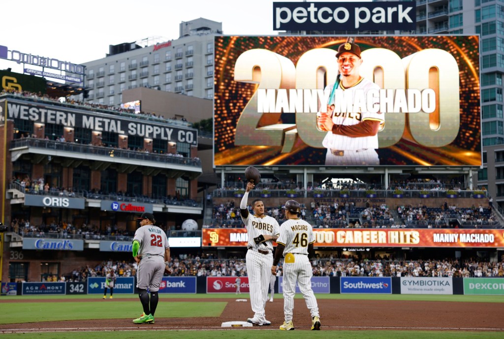 Padres' Manny Machado logs 2,000th career hit, then belts homer in loss