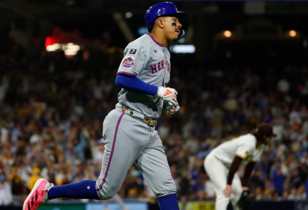Dylan Cease #84 of the San Diego Padres reacts after giving up a grand slam to Mark Vientos #27 of the New York Mets in the fifth inning at Petco Park on July 28, 2025 in San Diego, California. (K.C. Alfred / The San Diego Union-Tribune)