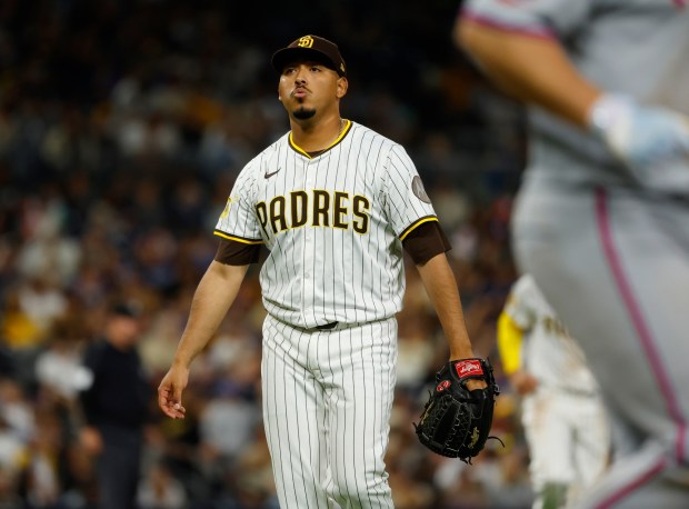 Jeremiah Estrada #56 of the San Diego Padres walks off the field after closing out the seventh inning against the New York Mets at Petco Park on July 28, 2025 in San Diego, California. (K.C. Alfred / The San Diego Union-Tribune)