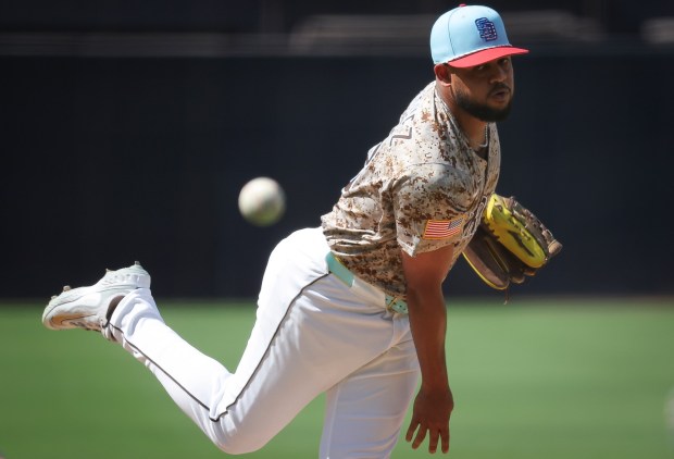 Randy Vasquez #98 of the San Diego Padres pitches against the Texas Rangers during the first inning at Petco Park on Friday, July 4, 2025 in San Diego, CA. (Meg McLaughlin / The San Diego Union-Tribune)