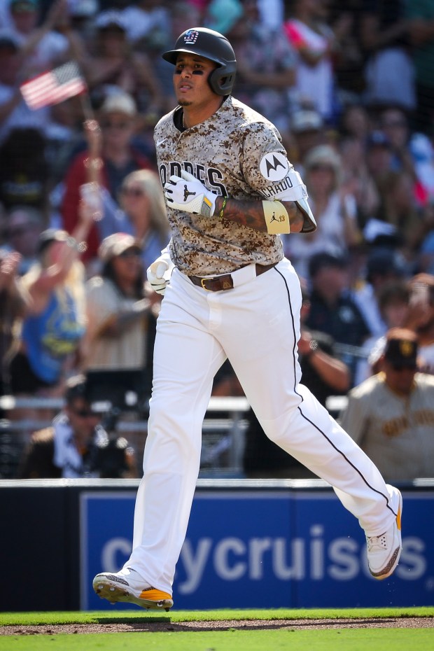 Manny Machado #13 of the San Diego Padres rounds the bases after a home run against the Texas Rangers during the fourth inning at Petco Park on Friday, July 4, 2025 in San Diego, CA. (Meg McLaughlin / The San Diego Union-Tribune)