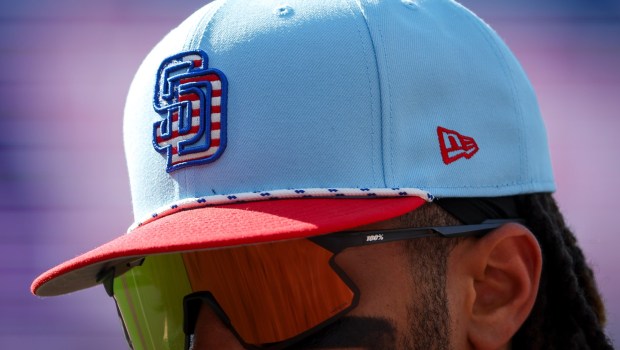 Fernando Tatis Jr. #23 of the San Diego Padres walks back to the dugout during the fifth inning against the Texas Rangers at Petco Park on Friday, July 4, 2025 in San Diego, CA. (Meg McLaughlin / The San Diego Union-Tribune)