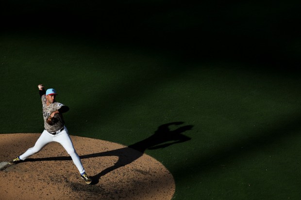 Jason Adam #40 of the San Diego Padres pitches against the Texas Rangers during the eighth inning at Petco Park on Friday, July 4, 2025 in San Diego, CA. (Meg McLaughlin / The San Diego Union-Tribune)