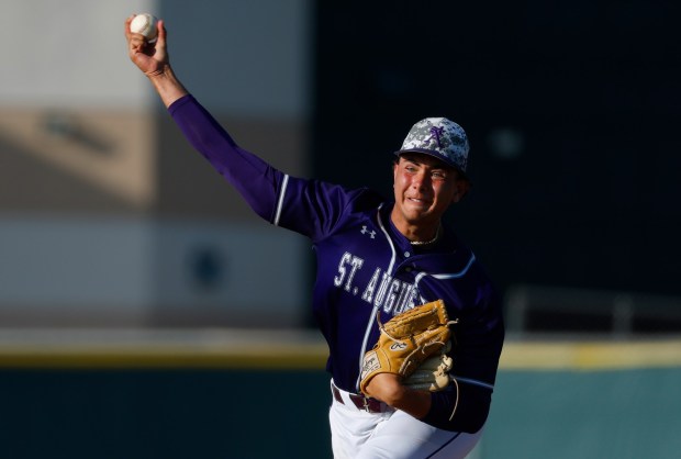 St. Aug.ine's Grayson Boles throws against Patrick Henry in an extra innings 0-0 tie in San Diego on Tuesday, April 22, 2025. (K.C. Alfred / The San Diego Union-Tribune)