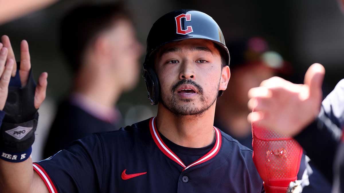 Cleveland Guardians left fielder Steven Kwan (38) celebrates with teammates after scoring a run against the Athletics during the fifth inning at Sutter Health Park.