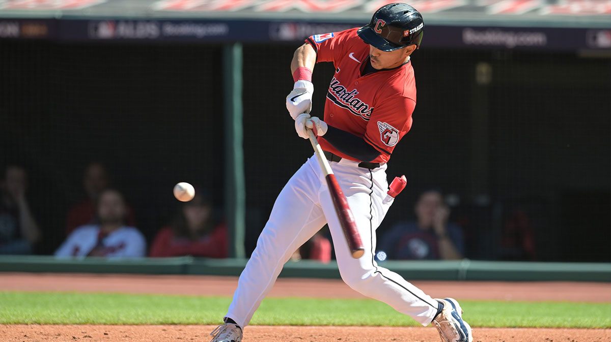 Oct 5, 2024; Cleveland, OH, USA; Cleveland Guardians outfielder Steven Kwan (38) hits a double in the first inning against the Detroit Tigers in game one of the ALDS for the 2024 MLB Playoffs at Progressive Field.