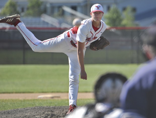 Yorkville's Michael Hilker delivers a pitch against Oswego East during a game on Friday, June 4, 2021.