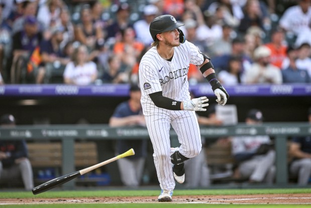 Hunter Goodman (15) of the Colorado Rockies watches the ball clear the outfield wall after hitting a homerun off of Colton Gordon (61) of the Houston Astros during the first inning at Coors Field in Denver on Tuesday, July 1, 2025. (Photo by AAron Ontiveroz/The Denver Post)