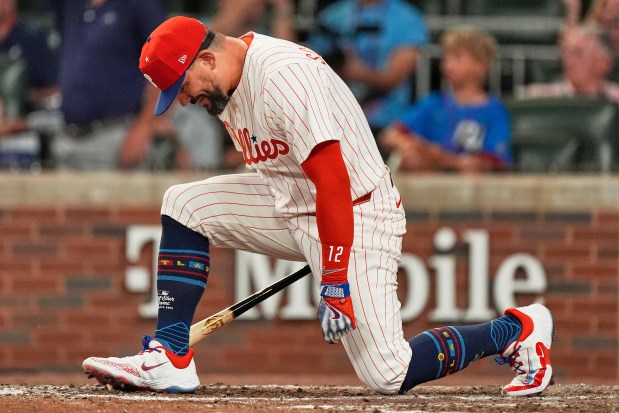 Philadelphia Phillies Kyle Schwarber celebrates after winning the tiebreaker at the MLB baseball All-Star game between the American League and National League, Tuesday, July 15, 2025, in Atlanta. (AP Photo/Mike Stewart)