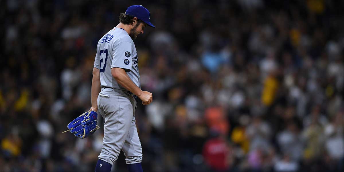 Los Angeles Dodgers starting pitcher Trevor Bauer (27) looks on after giving up a home run to San Diego Padres catcher Victor Caratini (not pictured) during the seventh inning at Petco Park.