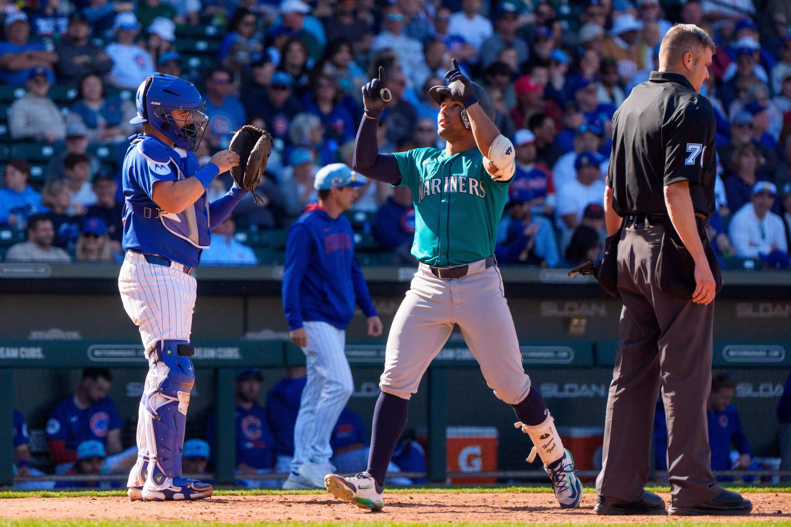 Mar 8, 2025; Mesa, Arizona, USA; Seattle Mariners catcher Harry Ford (72) reacts after hitting a home run in the eighth inning during a spring training game against the Chicago Cubs at Sloan Park. 