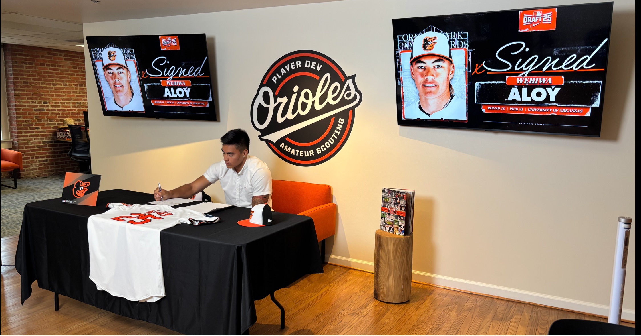 Wehiwa Aloy, a Baldwin High School graduate, signs his first professional baseball contract on Saturday. Aloy is the first-round Major League Baseball draft choice ever from Maui. Jamie Aloy photo