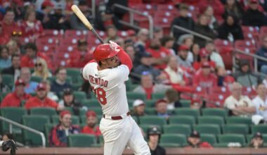 Arenado homers and Gray pitches Cardinals past Twins 5-3 in opener