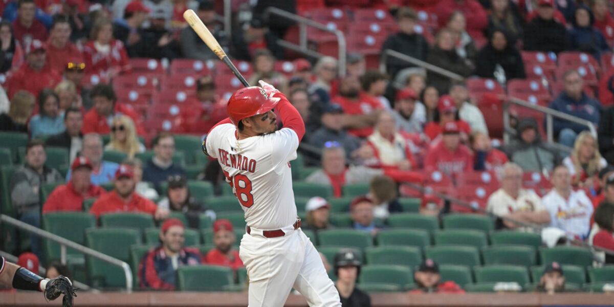 Arenado homers and Gray pitches Cardinals past Twins 5-3 in opener