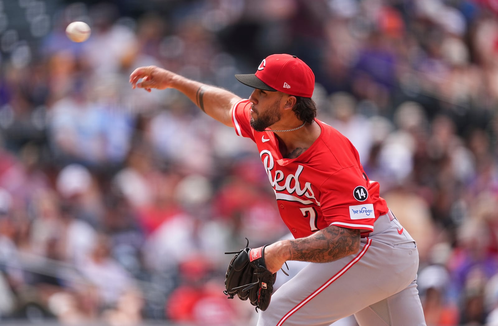 Cincinnati Reds relief pitcher Lyon Richardson works against the Colorado Rockies in the eighth inning of a baseball game Sunday, April 27, 2025, in Denver. (AP Photo/David Zalubowski)