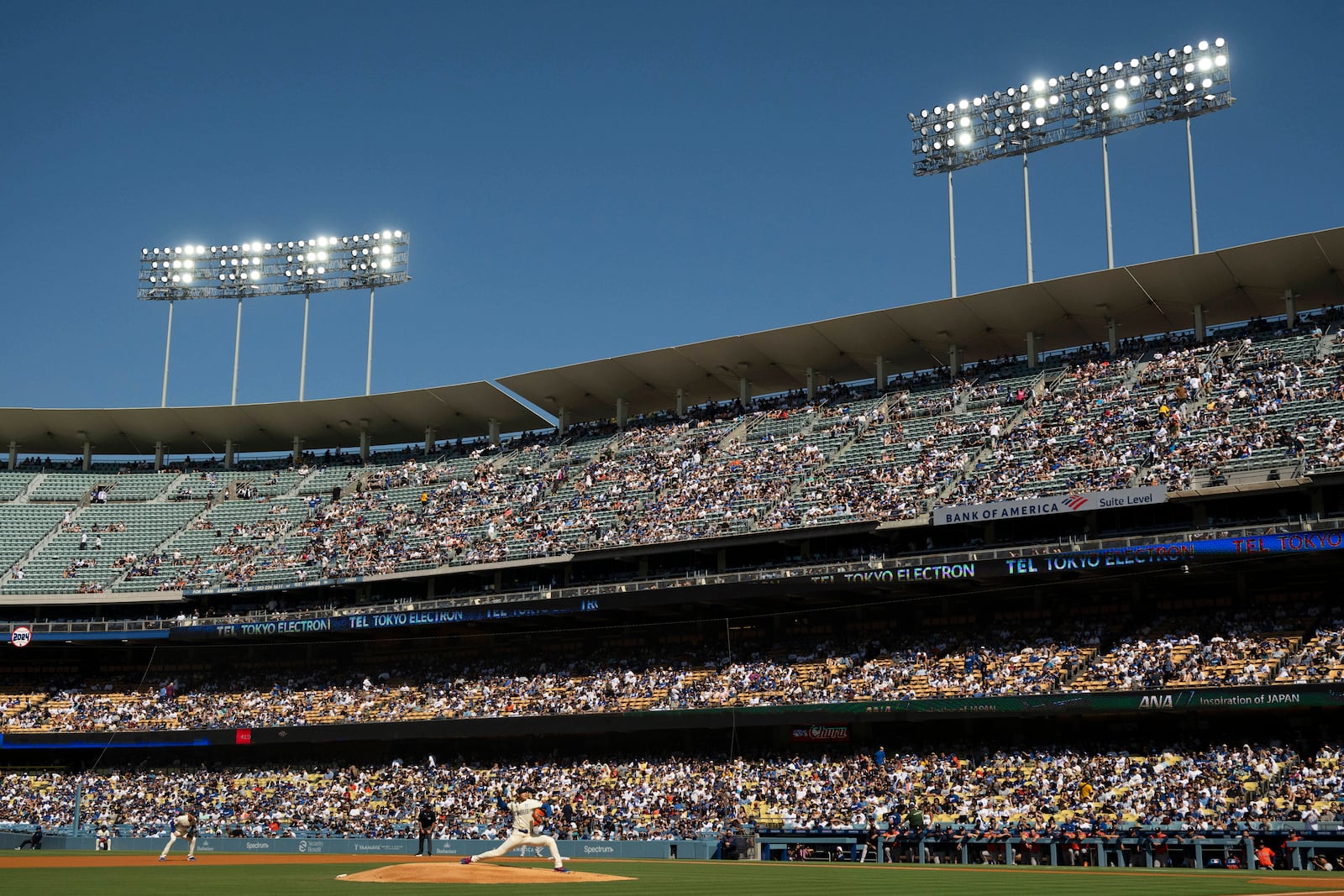 Los Angeles Dodgers starting pitcher Shohei Ohtani delivers during the first inning of a baseball game against the Houston Astros in Los Angeles, Saturday, July 5, 2025. (AP Photo/Kyusung Gong)