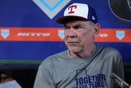 Texas Rangers manager Bruce Bochy talks with the media before a baseball game against the...