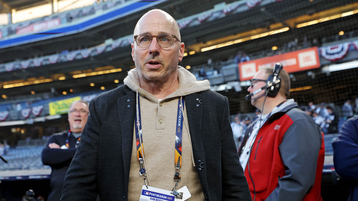 New York Yankees general manager Brian Cashman walks on the field before game three of the 2024 MLB World Series between the New York Yankees and the Los Angeles Dodgers at Yankee Stadium. 