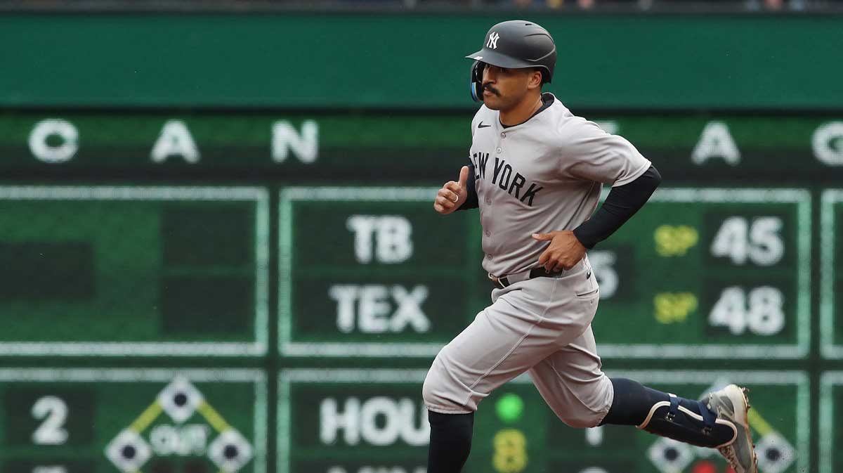 ; New York Yankees center fielder Trent Grisham (12) circles the bases on a solo home run against the Pittsburgh Pirates during the third inning at PNC Park.