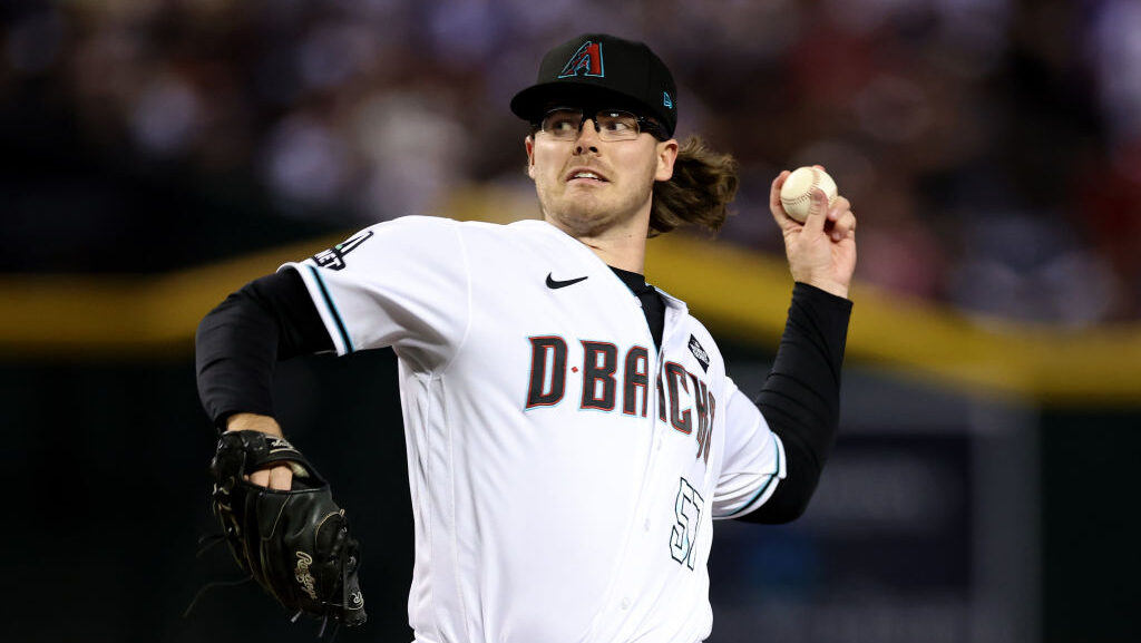 Diamondbacks reliever Andrew Saalfrank throws a pitch...