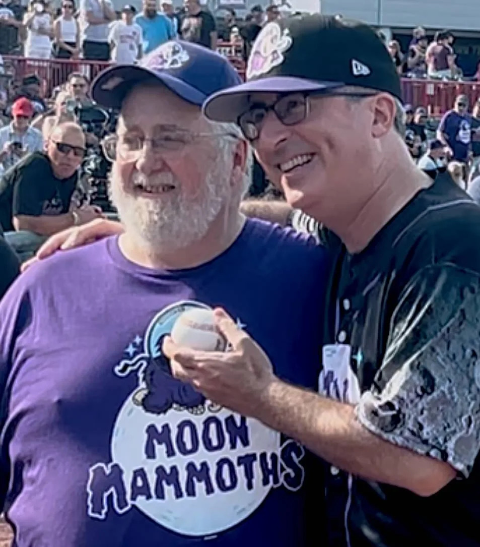 Erie's George Moon and John Oliver of HBO's "Last Week Tonight" pose before the July 19 Eastern League baseball game between Chesapeake and the renamed Erie Moon Mammoths at UPMC Park.