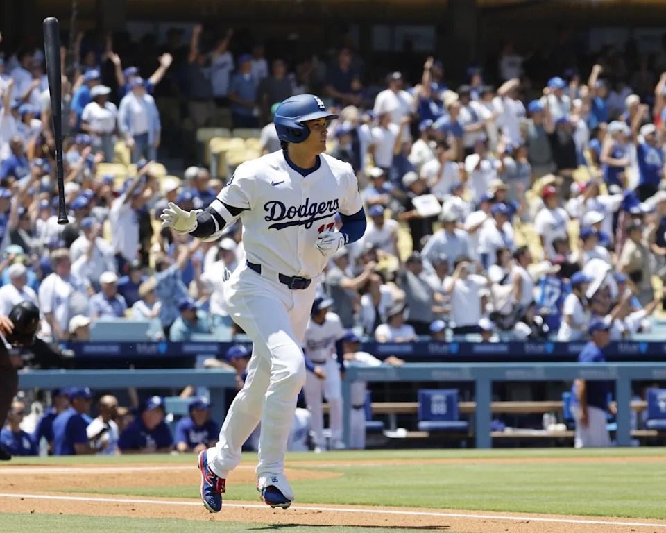 Shohei Ohtani flips the bat after hitting a 441-foot home run to left-center in the first inning against the Minnesota Twins.