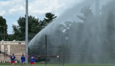 Firefighter ends baseball game with fire hose after ball hits his car, team says