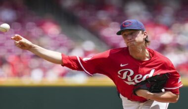 Cincinnati Reds pitcher Brady Singer throws during the third inning of a baseball game against the Tampa Bay Rays, Sunday, July 27, 2025, in Cincinnati. (AP Photo/Jeff Dean)