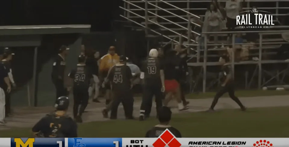 The individual in red shorts makes their way onto the field. @MyMilfordTV/YouTube