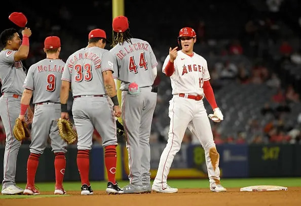 Shohei Ohtani with the Los Angeles Angels in 2023, facing Elly De La Cruz and the Cincinnati Reds.