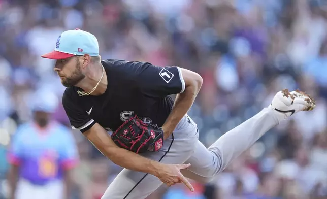 Chicago White Sox starting pitcher Adrian Houser works against the Colorado Rockies in the first inning of a baseball game Friday, July 4, 2025, in Denver. (AP Photo/David Zalubowski)