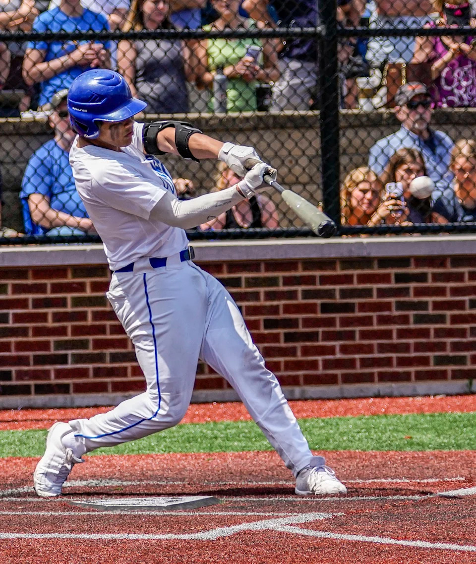 Whitefish Bay's Mitch Voit (1) connects for a single to left during the game against Arrowhead at Cahill Park in Whitefish Bay on Saturday, May 14, 2022.