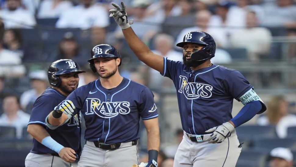 Jonathan Aranda, left, was one of three Tampa Bay Ray players to leave Thursday's game against the New York Yankees in New York. (AP Photo)
