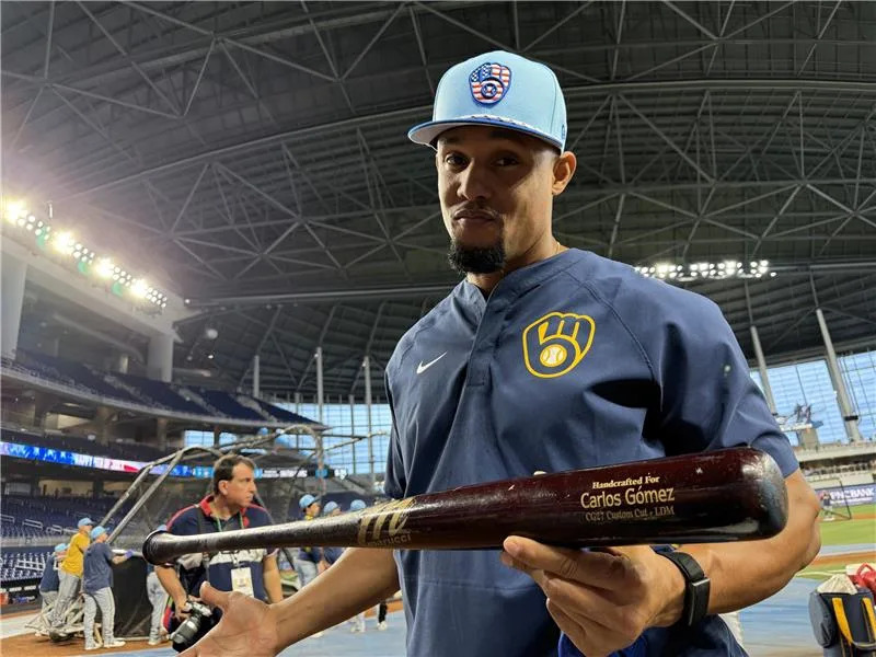 Former Brewers outfielder Carlos Gomez took batting practice with his former team in Miami on July 4 in preparations for his participation in the Brewers alumni home run derby on July 25.