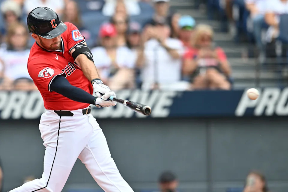 Jul 20, 2025; Cleveland, Ohio, USA; Cleveland Guardians designated hitter David Fry (6) hits an RBI single during the first inning against the Athletics at Progressive Field. Mandatory Credit: Ken Blaze-Imagn Images