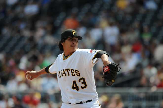 PITTSBURGH - APRIL 18:  Relief pitcher Jesse Chavez #43 of the Pittsburgh Pirates pitches against the Atlanta Braves during a game at PNC Park on April 18, 2009 in Pittsburgh, Pennsylvania.  The Pirates defeated the Braves 10-0.  (Photo by George Gojkovich/Getty Images)