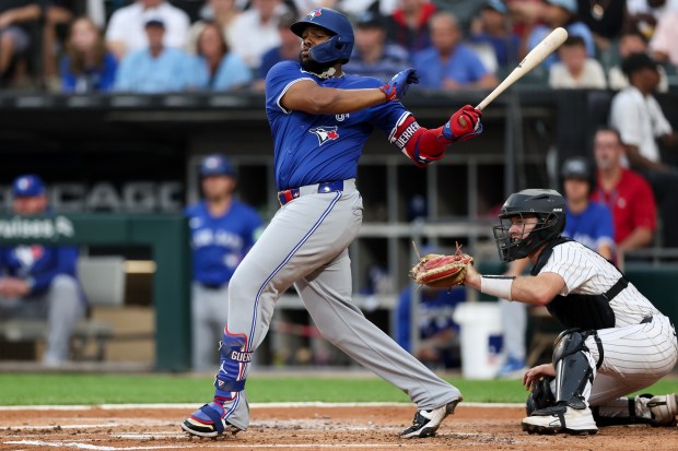 Toronto Blue Jays first base Vladimir Guerrero Jr. (27) hits a RBI double during the third inning against the Chicago White Sox at Rate Field Tuesday July 8, 2025, in Chicago. (Armando L. Sanchez/Chicago Tribune)