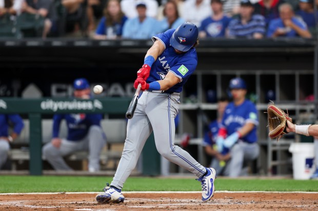 Toronto Blue Jays third base Addison Barger (47) hits a RBI double during the third inning against the Chicago White Sox at Rate Field Tuesday July 8, 2025, in Chicago. (Armando L. Sanchez/Chicago Tribune)