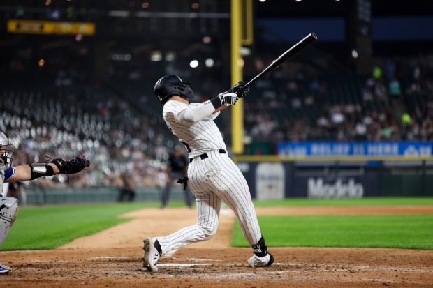 Chicago White Sox third base Josh Rojas (5) hits a solo-homer during the sixth inning against the Toronto Blue Jays at Rate Field Tuesday July 8, 2025, in Chicago. (Armando L. Sanchez/Chicago Tribune)
