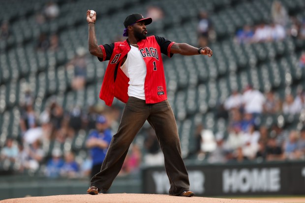Chicago Bears cornerback Jaylon Johnson throws out the first pitch before the Chicago White Sox play the Toronto Blue Jays at Rate Field Tuesday July 8, 2025, in Chicago. (Armando L. Sanchez/Chicago Tribune)