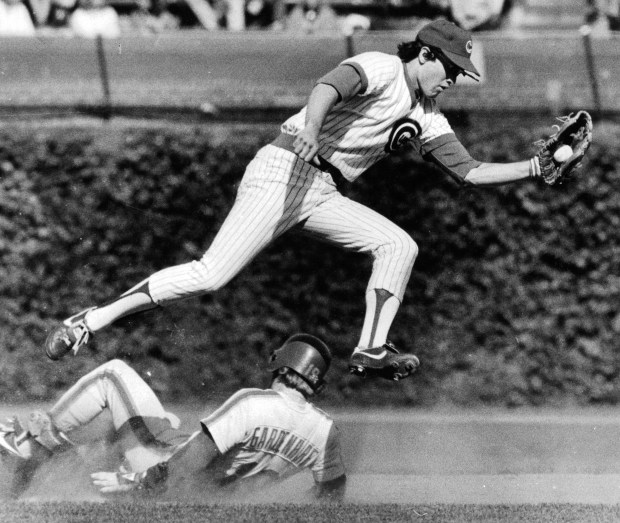 Cubs second baseman Ryne Sandberg gloves Butch Benton's throw after the Mets Ron Gardenhire steals second in September 1982 at Wrigley Field. (Phil Mascione/Chicago Tribune)