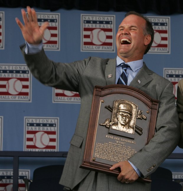 Ryne Sandberg, clutching his Hall of Fame plaque, waves to the Cooperstown, New York, crowd on July 31, 2005. (Phil Velasquez/Chicago Tribune)
