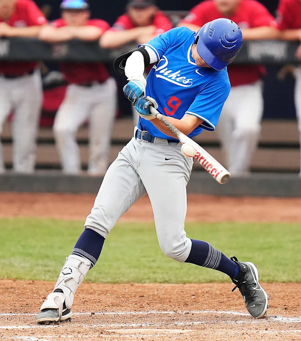 Whitefish Bay's junior second baseman J.D. Dix  (9) hits a double to left center during the WIAA Division 1 State Baseball Semifinals against Stevens Point on Wednesday June 14, 2023 at the Fox Cities Stadium in Grand Chute, Wis.